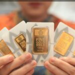 Harga Emas Antam Anjlok Rp25.000 ke Rp2,605 Juta per Gram