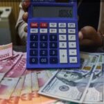 Rupiah Tembus Rp18.000 per Dolar AS pada Selasa Siang, BI Ungkap Penyebab dan Siapkan Intervensi